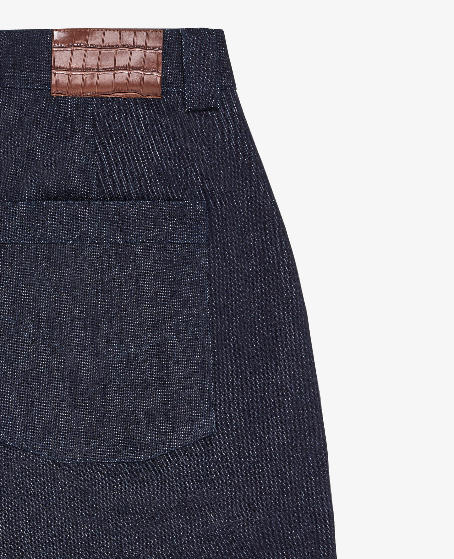 PLEATED RAW DENIM IN INDIGO